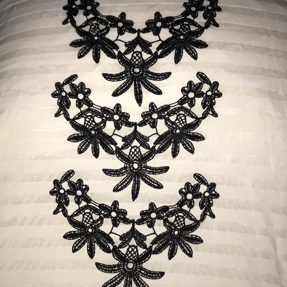 New set of three black lace appliqués.